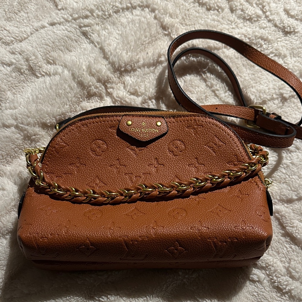 Bag with top handle and shoulder strap and removable braided chain. New!